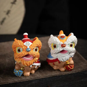 The new Chinese trendy resin tea pet of waking lion, Forbidden City fortune-telling tea tray ornament, desktop and living room cultural and creative lion dance entrance decoration.