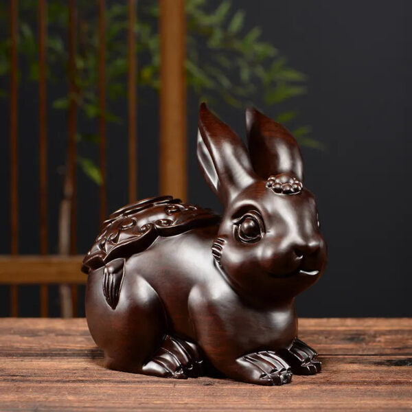 A rabbit woodcarving ornament, a real wood-carved animal of the Chinese zodiac, a handicraft gift for home, study, office desktop and girlfriend.