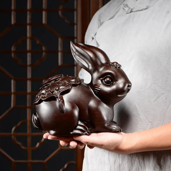 A rabbit woodcarving ornament, a real wood-carved animal of the Chinese zodiac, a handicraft gift for home, study, office desktop and girlfriend.