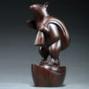 Ebony wood carving rat ornaments, the rat among the twelve Chinese zodiac animals for attracting wealth. They are home decorations for the living room and handicraft gifts made of mahogany.